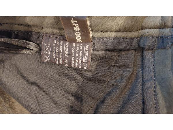 Pantalon de chasse en cuir kaki de la marque "Verney Caron" neuf.