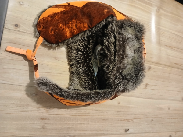 Veste de chasse et chapka