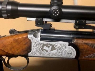 Double Express Antonio Zoli 9.3x74R + Schmidt et Bender avec montage pivot et mallette.